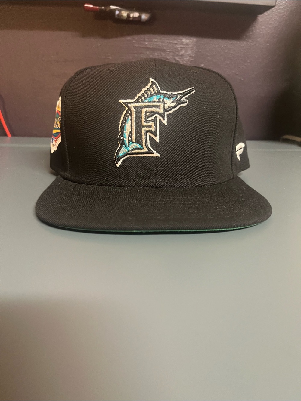 Fanatics Black Miami Marlins F Logo Snapback Hat with Teal Accents